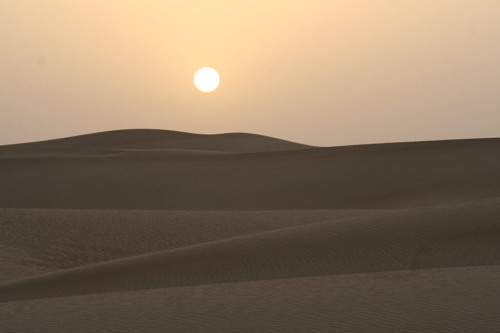 Desert travels, sunset, travel writing, Laura McVeigh writer